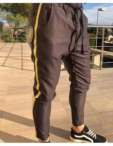Pantalón negro lateral oro